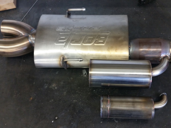 Helmholtz resonators and Borla muffler